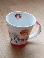 Tasse mit Marienkäfern und Blumen