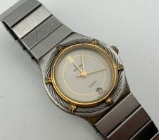 Consul Quarzuhr Stahl Gold Damenuhr Datum Swiss Made