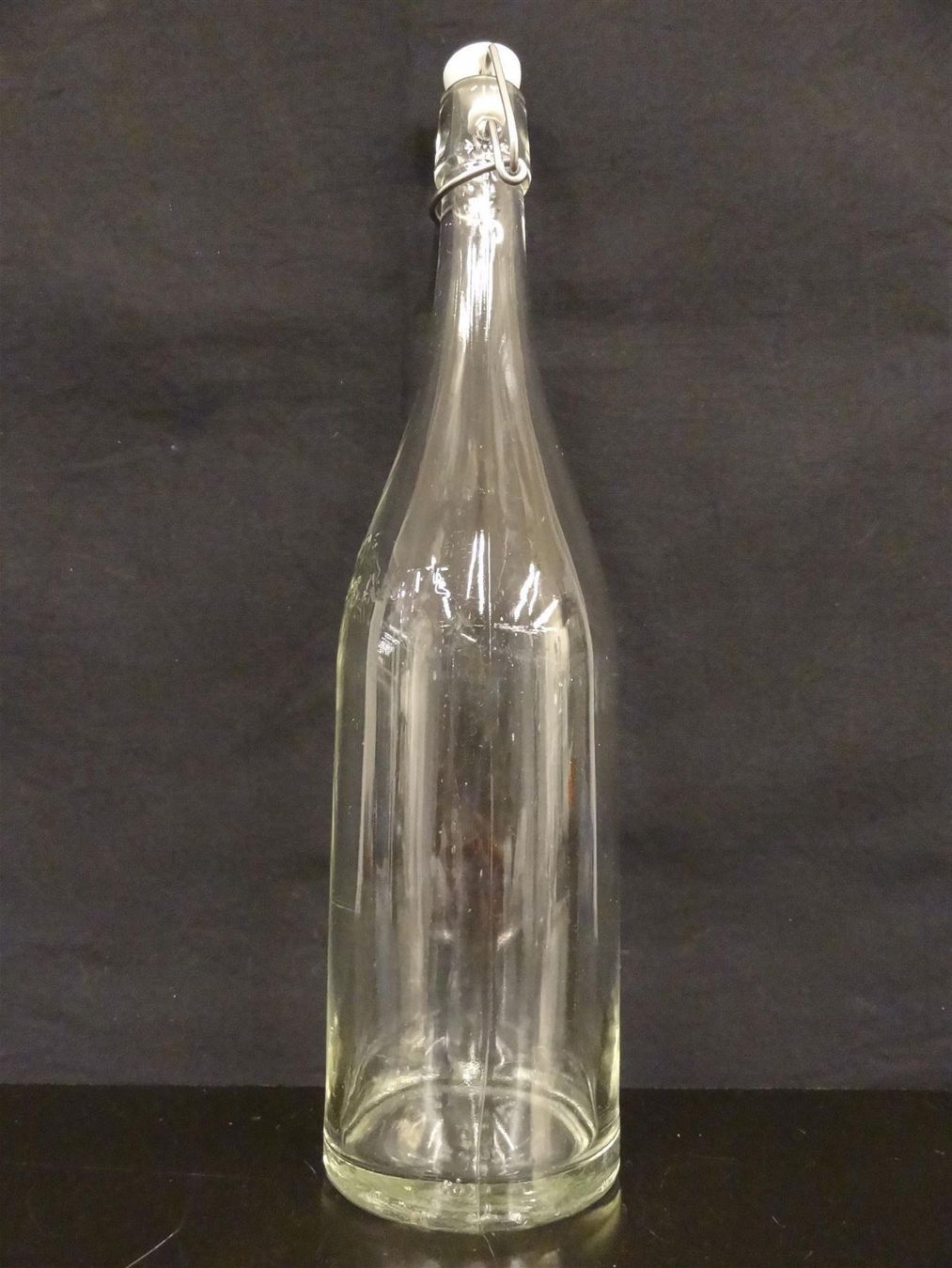 Bicchieri, Caraffe & Bottiglie: alte Flasche HENNIEZ SANTÉ – Usato da Kerzers venduto da Flaschenposten 2