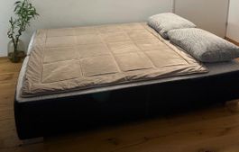 Modern black sofa bed with pillows - barely used!