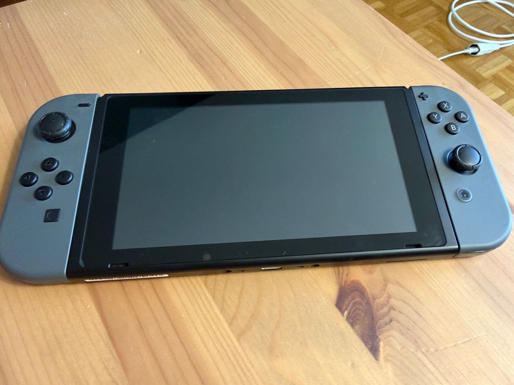 Nintendo Konsolen: Nintendo Switch console, gris, avec accessoires, bon état – Gebraucht aus Romanel-sur-Lausanne von pal_wwb8 2