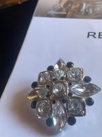 Magnifique bague argentée avec zircons