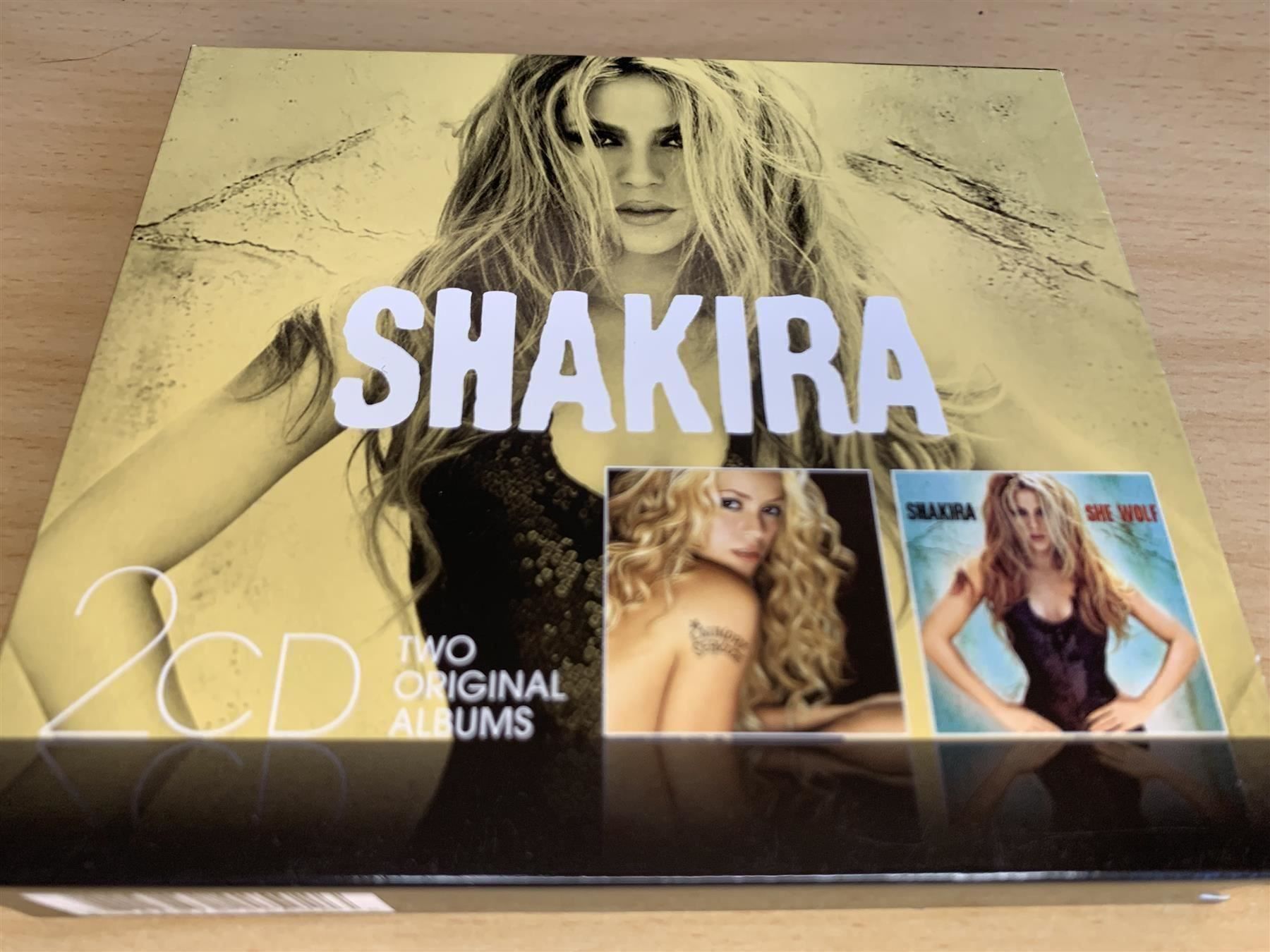 CDs: Shakira – Laundry Service / She Wolf - 2 CD – Gebraucht aus Rikon im Tösstal von Alpenmutz
