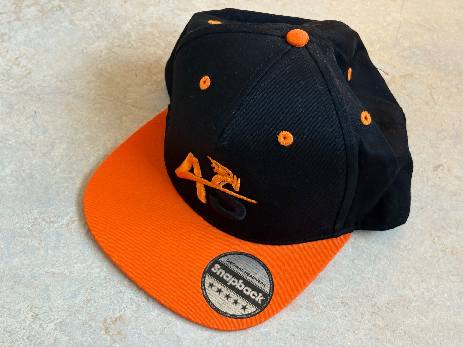 Copricapi, berretti & cappellini: Snapback Cap schwarz/orange (2 Stk.) – Nuovo (secondo la descrizione) da Dietikon venduto da The-Star-Shop 1