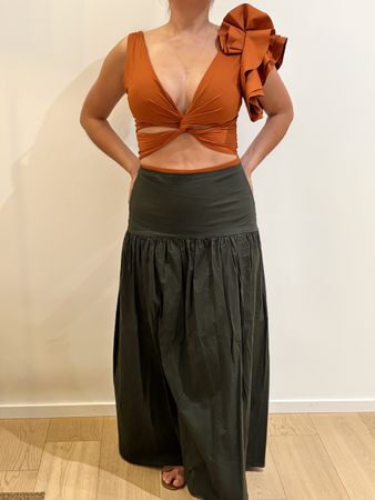 Orange bodysuit with decorative touch
