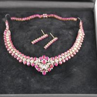 Goldschmuckset mit Rubinen und Diamanten
