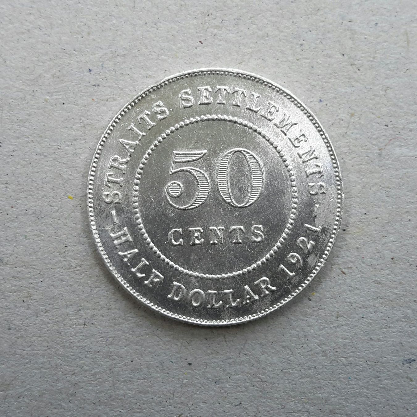 Tutti le monete: Straits Settlements , 50 Cents , 1921 , Silber . – Usato da Burgdorf venduto da Olli.34 1