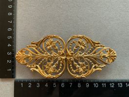 Gürtelschnalle gold farbig