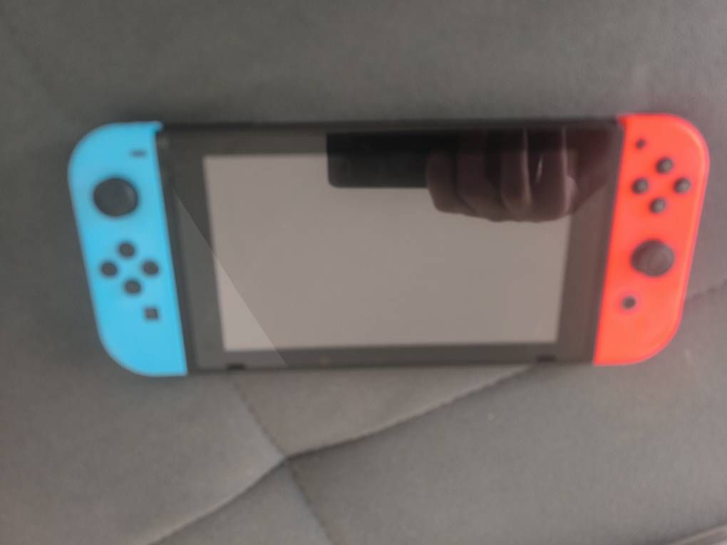 Consoles: Nintendo Switch + Controller + 5 Spiele – D'occasion à Schaffhausen par Beastware 1