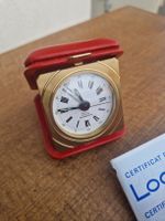 Looping Reiseuhr Quartz Messing, rot mit Box  Garantieschein