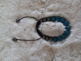Funkelndes Armband mit blauen Steinen - Neuwertig!