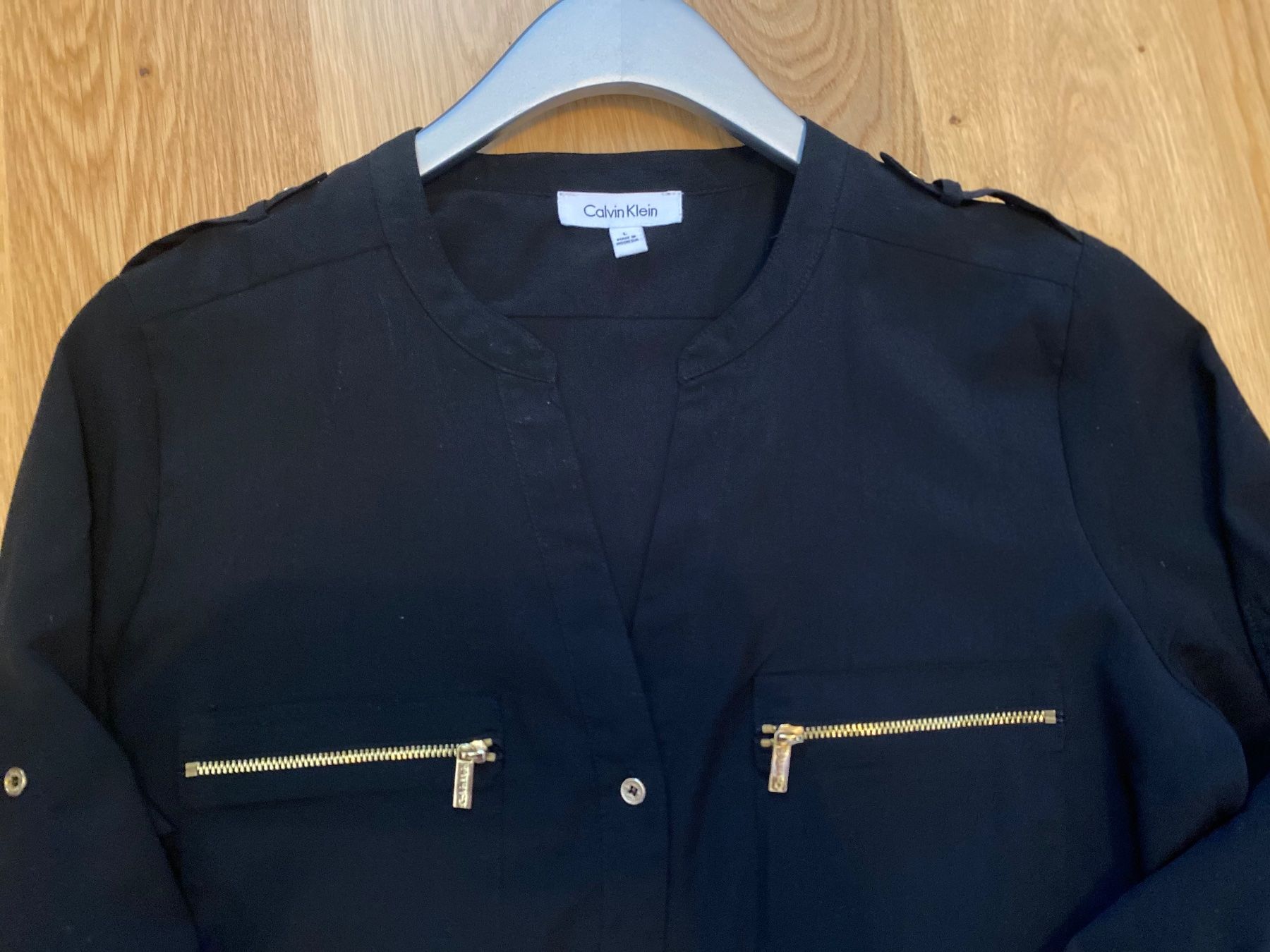 Calvin Klein Chemisiers: Modische Calvin Klein Bluse schwarz Gold – D'occasion à Uetikon am See par ansi2601 3