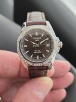 Montre Tissot PRC 100 cadran marron lunette diamants