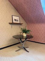 Table basse MCM plateau en verre fumé rond