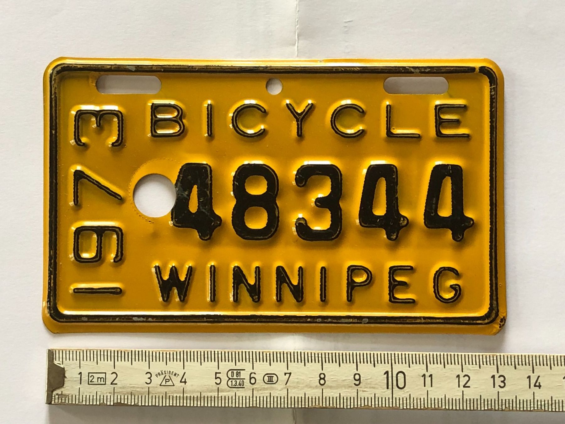 Insegne: Velonummer Winnipeg, Kanada 1973 – Usato da Ganterschwil venduto da ganterb