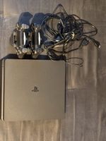 Console Sony PlayStation 4 Slim avec 2 manettes noir