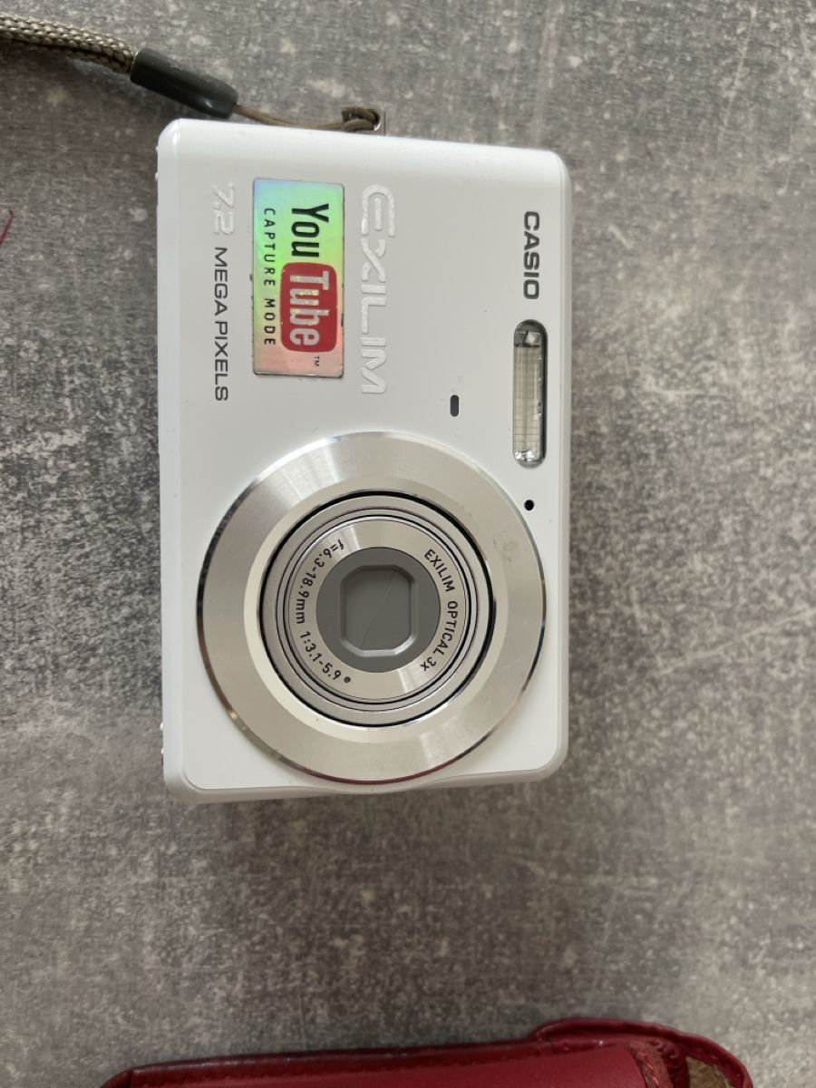 Fotocamera: Casio Exilim EX-Z77 Digital Camera - Includes Case & Charger – Nuovo (secondo la descrizione) da Winterthur venduto da shp_xcc5 2