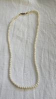 Lunga collana di perle