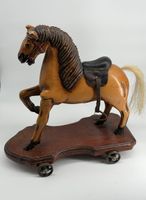 Cheval à roulettes ancien en bois, jouet de collection