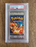 PSA 10 Pokémon Base Set 1st, edition Glurak Artwork Booster 