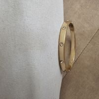 Armreif goldfarben mit Schmucksteinen  neu