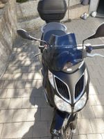 Roller Aprilia Sport City 125 schwarz 