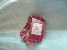 SWATCH SQUARE AMOR DE FUEGO