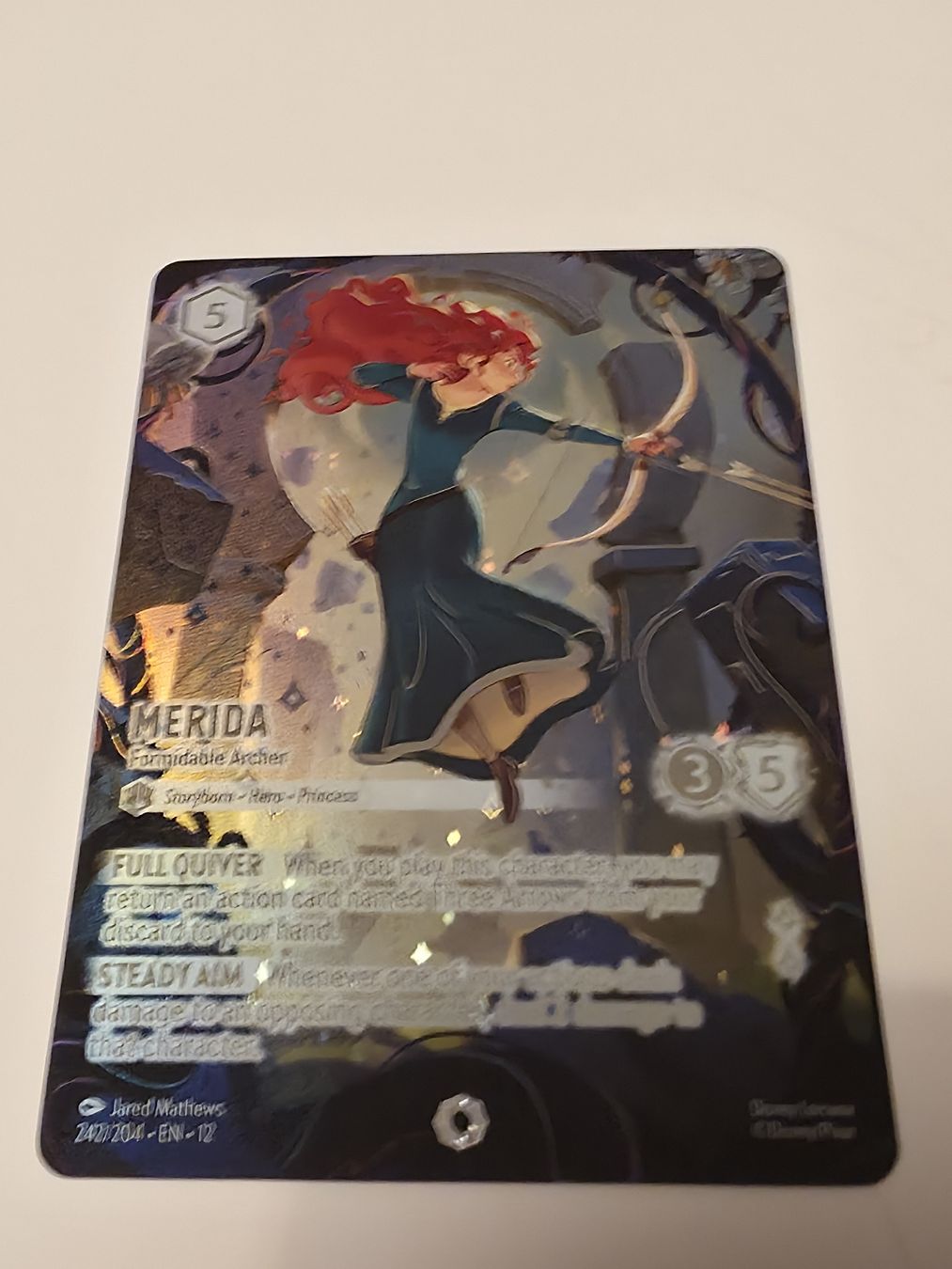 Disney Cartes à collectionner: Disney Lorcana Merida Iconic 242 EN12 – Neuf (Voir description) à Emmenbrücke par Minato96 2