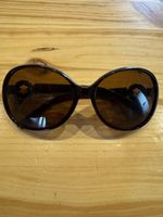 Lunettes de soleil marron vintage - Look estival chic