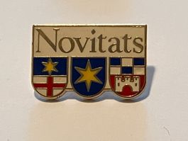 1 Pin Novitats