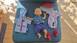 Spielpuppe mit Kleider Set gebraucht guter Zustand