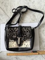 Umhängetasche / Handtasche Fellmuster schwarz weiss Zara