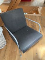 Fauteuil en tissu noir et métal