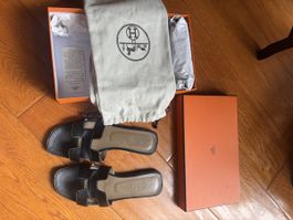 Sandales Oran Hermès noir cuir T38 excellent état été 2023