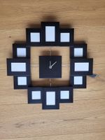 Wanduhr mit Bildern