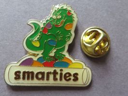 PIN DINO SMARTIES DINOSAURIER, SCHOKO-BONBON