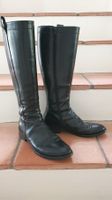 Elegante, schwarze Lederstiefel