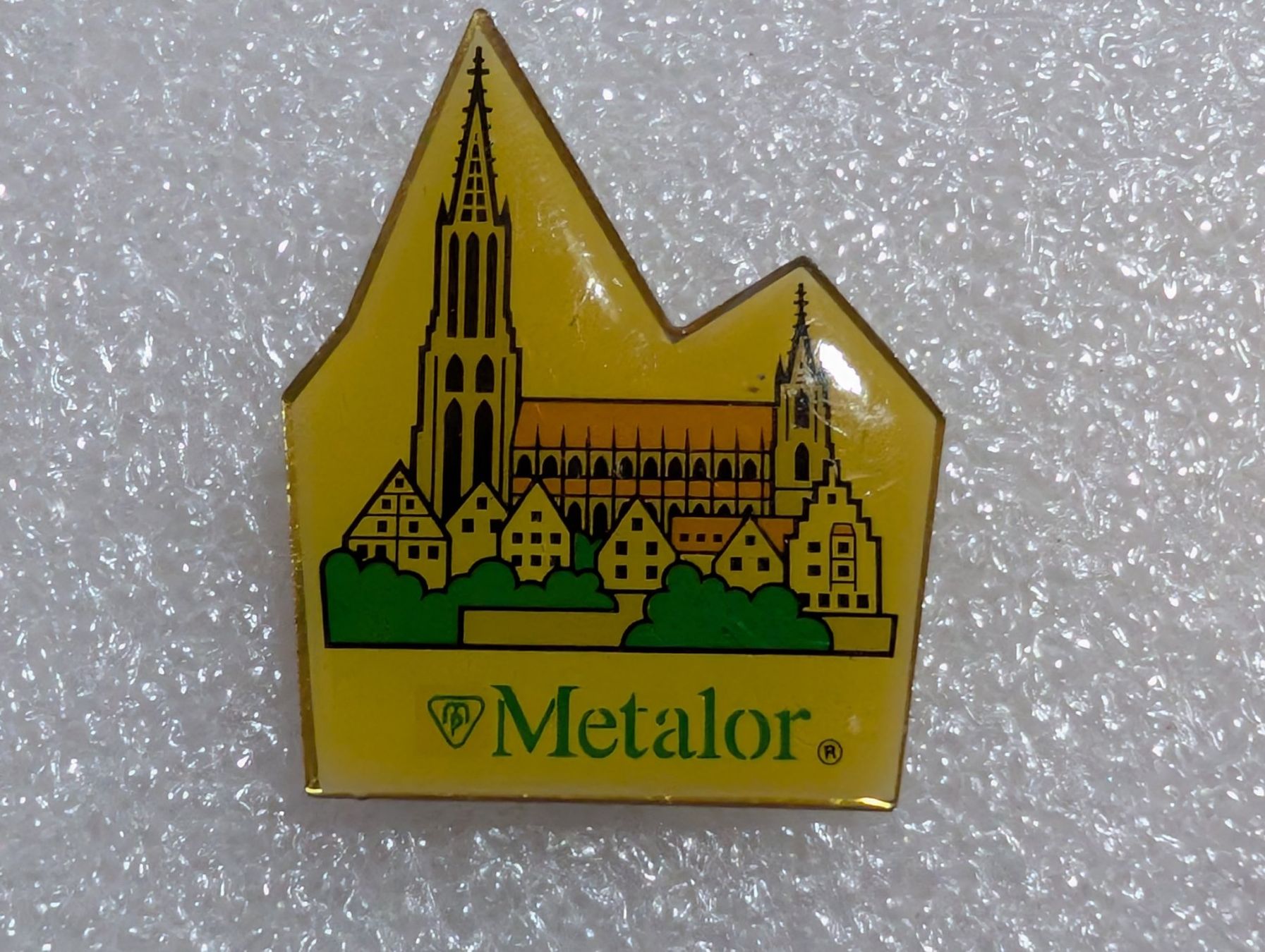 Plaketten & Abzeichen: Ansteckpin 250: Metalor – Gebraucht aus Oppligen von Pin-Fall-Shop