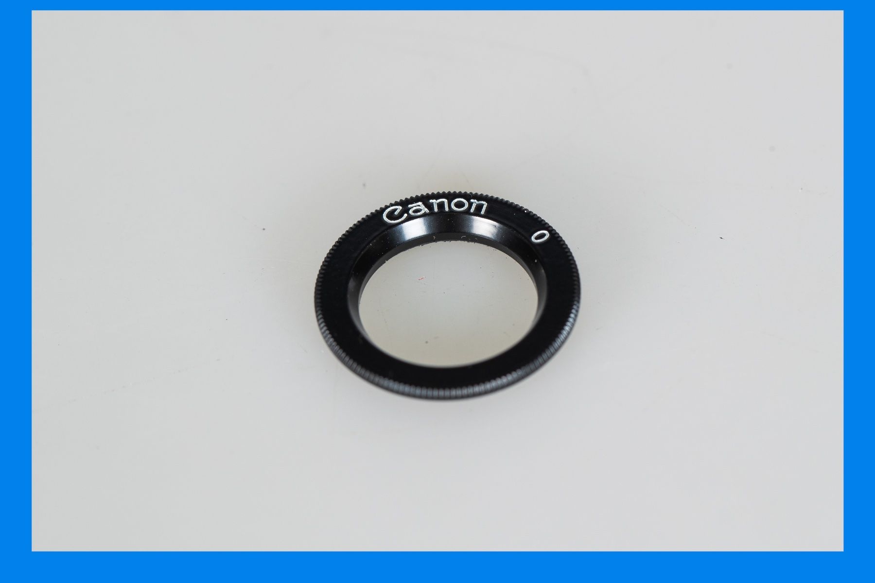 Plaketten & Abzeichen: Canon Dioptric Adjustment Lens R – Gebraucht aus Muralto von FotoGarbani 1