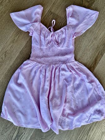 Rosa Kleid, Motiv mit Schleifen, integriertem Short, Gr. XXS