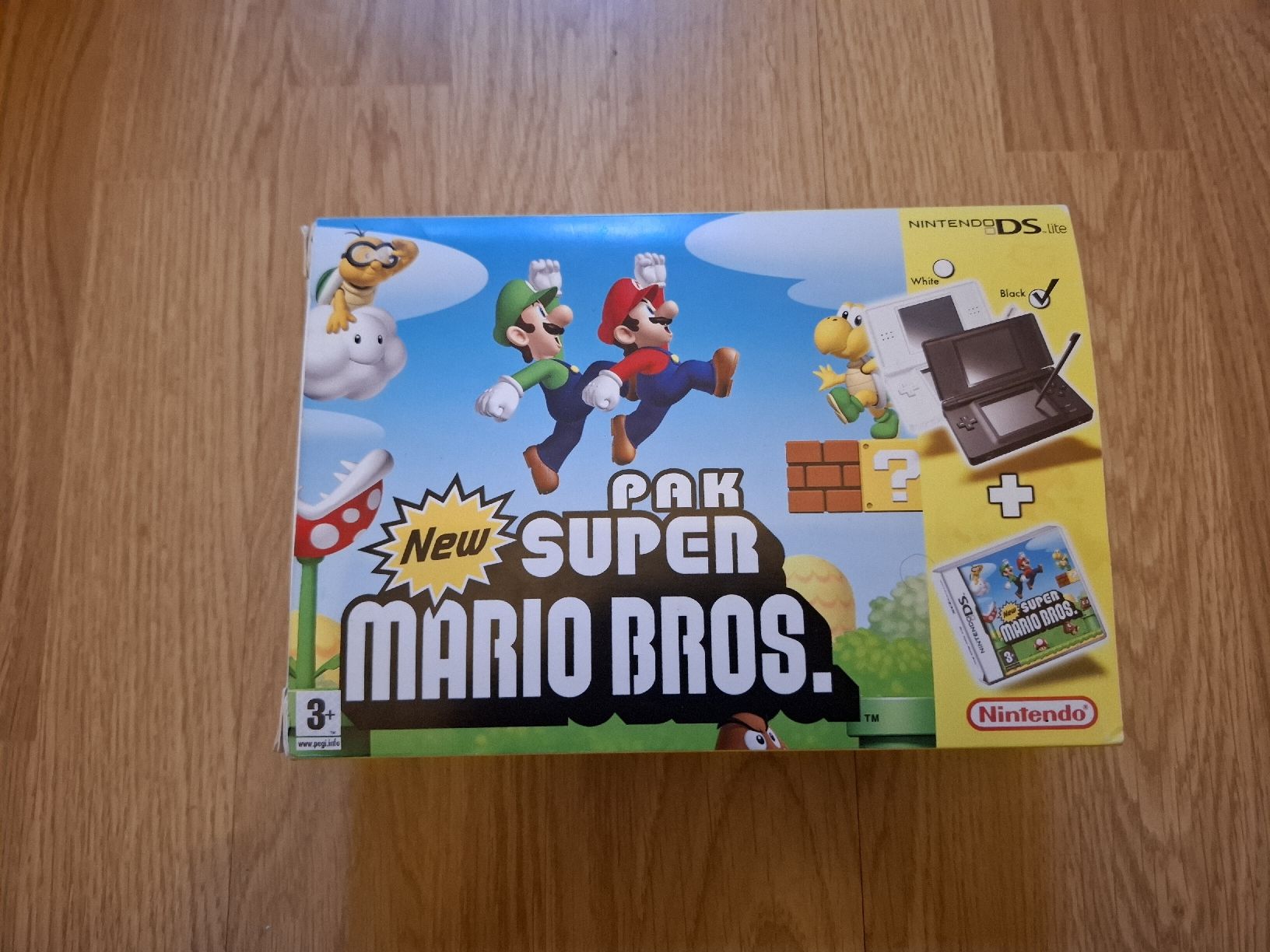 Nintendo Spiele: Nintendo DS lite + New Super Mario Bros – Gebraucht aus Biel/Bienne von st-Pixel