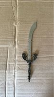 Sabre décoratif, lame ornée, poignée travaillée