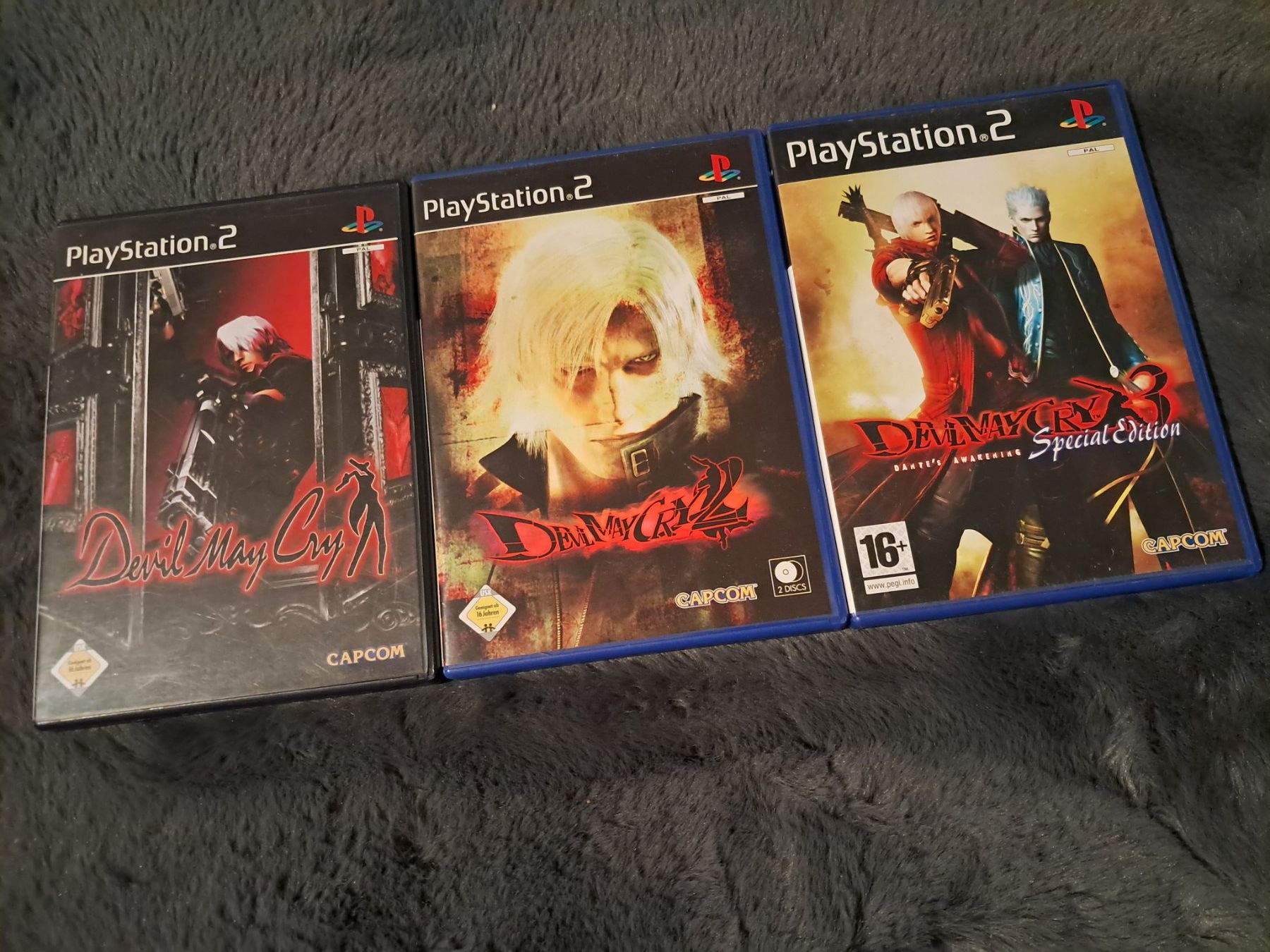 Spiele: PS2,   SLY 1,2 3.  JAK 1,2,3.   DEVIL MAY CRY 1,2,3 – Gebraucht aus Itingen von AnTiNoRmAl 3