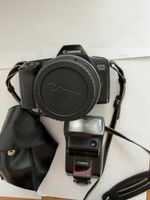appareil photo est un reflex argentique Canon EOS 1000 
