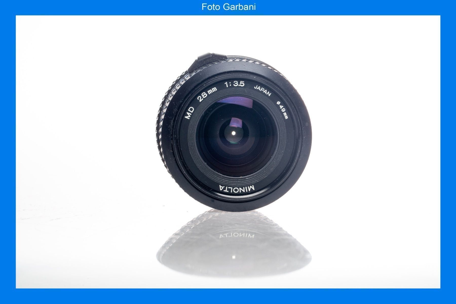Minolta Obiettivi: Minolta MD 28mm f/3.5 – Usato da Muralto venduto da FotoGarbani