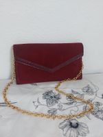 Pochette vintage en daim