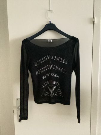 Edles schwarzes transparentes Top mit Silberapplikationen