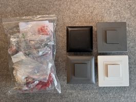 Konvolut Feller Schalter in verschiedenen Farben und Formen