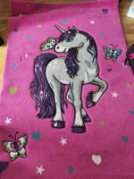 Mädchenzimmer Teppich mit Einhorn Motiv.