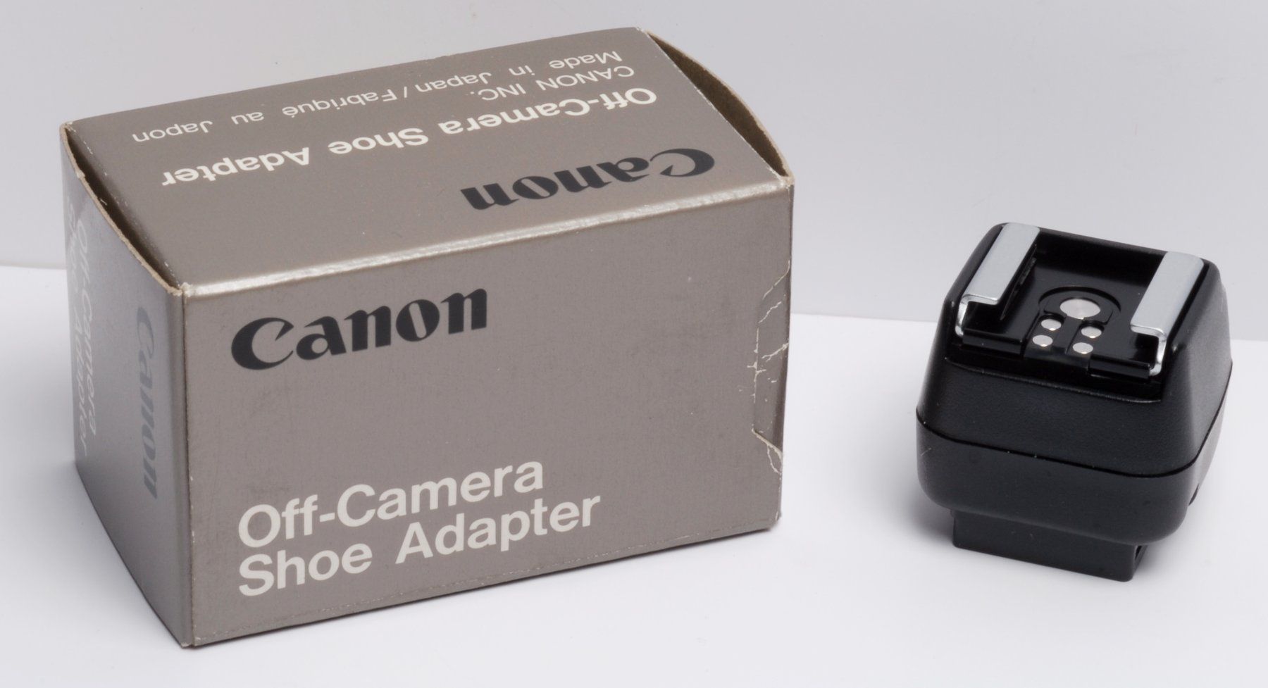 Canon Blitze: CANON off-Camera Shoe Adapter - externer Blitzkontakt – Neu (gemäss Beschreibung) aus Lostorf von real-value